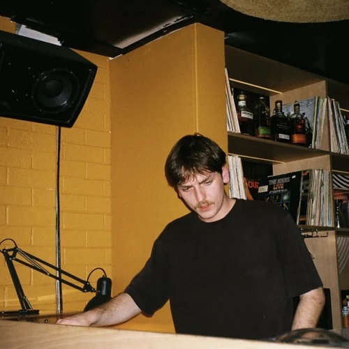 Off Tap behind the decks